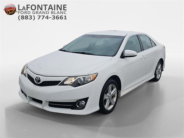 used 2014 Toyota Camry car, priced at $12,000