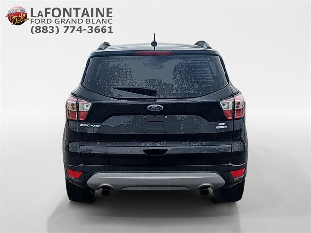 used 2018 Ford Escape car, priced at $10,300