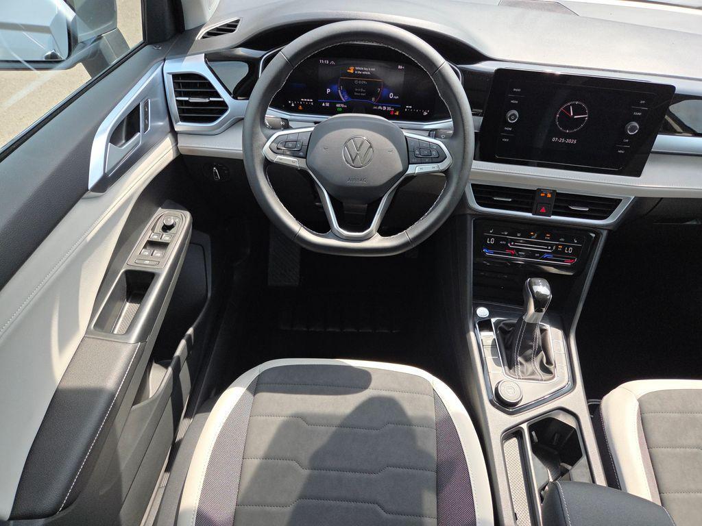 used 2025 Volkswagen Taos car, priced at $28,429