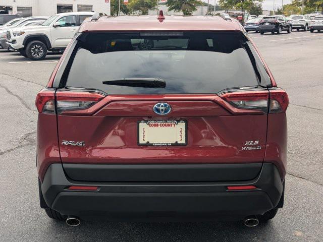 used 2024 Toyota RAV4 Hybrid car, priced at $33,617