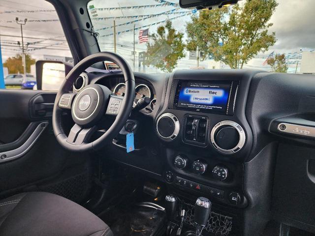 used 2018 Jeep Wrangler JK Unlimited car, priced at $17,858