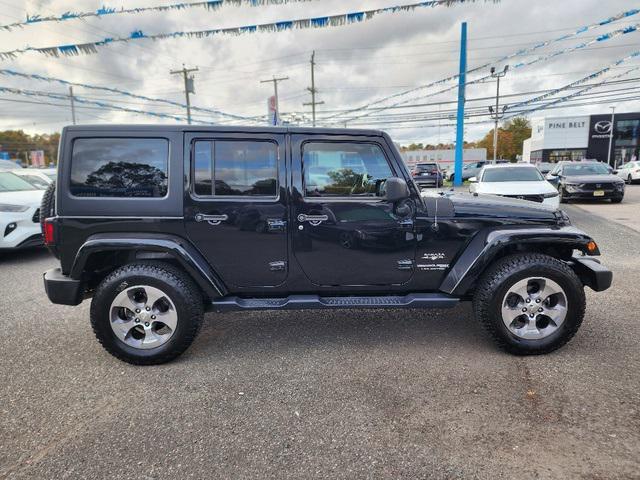 used 2018 Jeep Wrangler JK Unlimited car, priced at $17,858