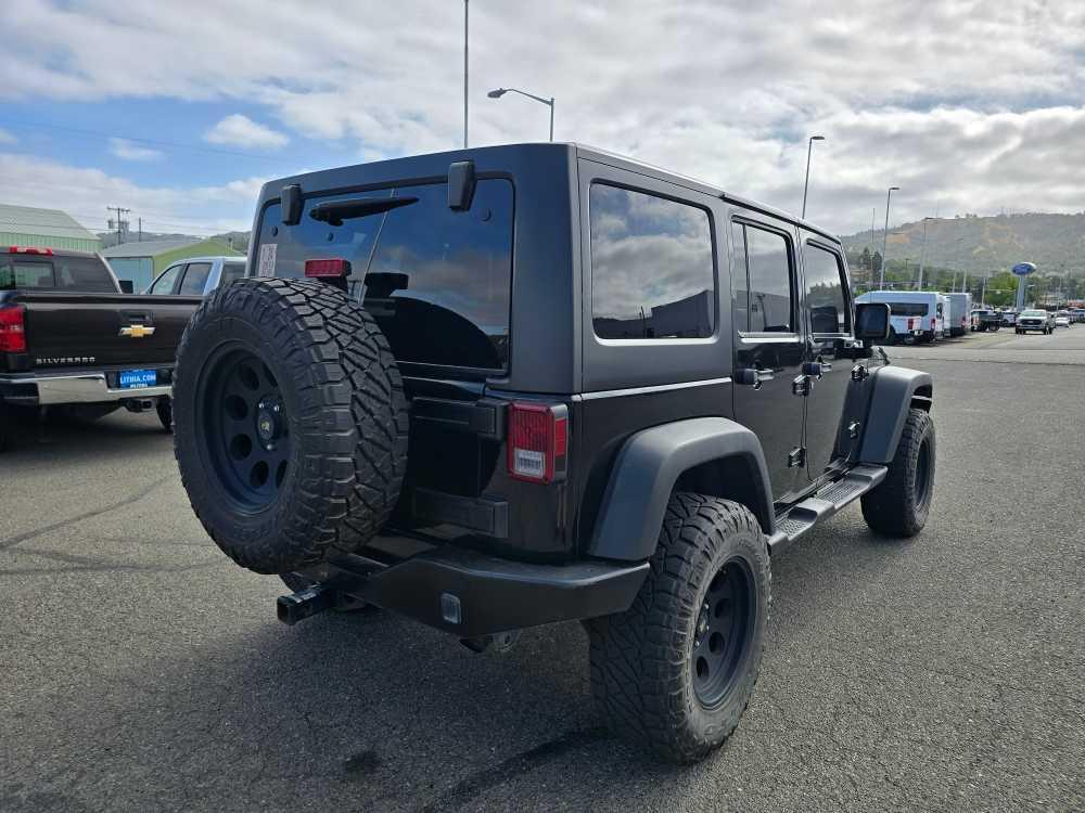 used 2013 Jeep Wrangler Unlimited car, priced at $23,995