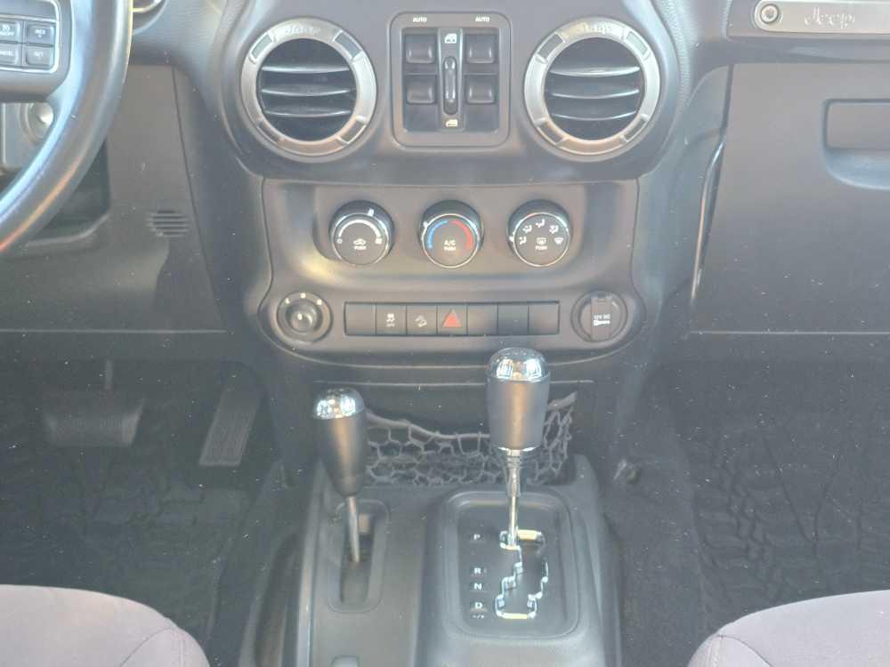 used 2015 Jeep Wrangler Unlimited car, priced at $22,495