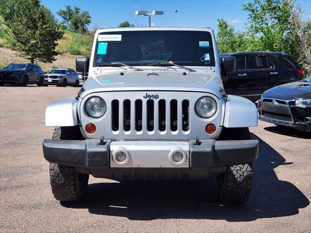 used 2012 Jeep Wrangler Unlimited car, priced at $15,888