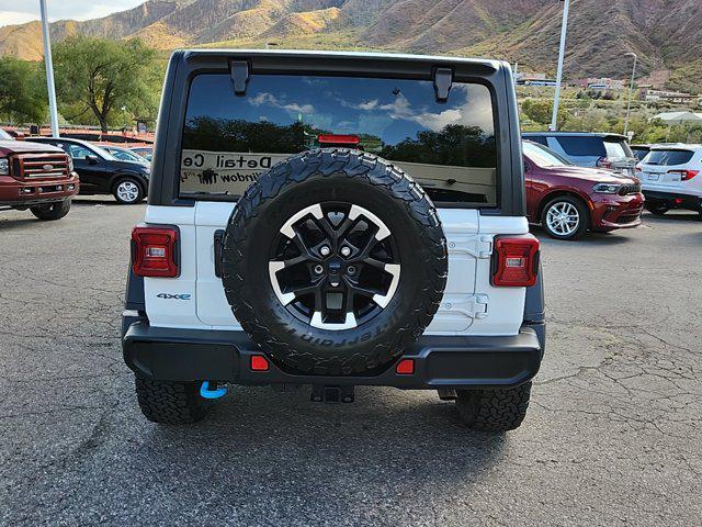 used 2024 Jeep Wrangler 4xe car, priced at $38,697