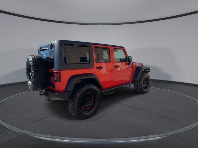 used 2013 Jeep Wrangler Unlimited car, priced at $18,880