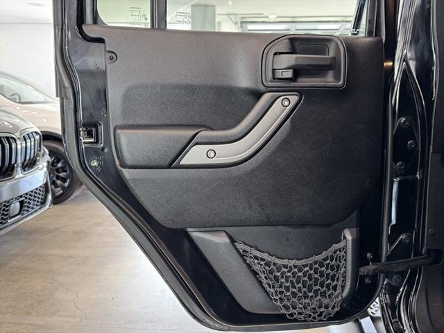 used 2011 Jeep Wrangler Unlimited car, priced at $12,490