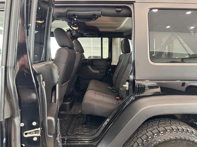 used 2011 Jeep Wrangler Unlimited car, priced at $12,490