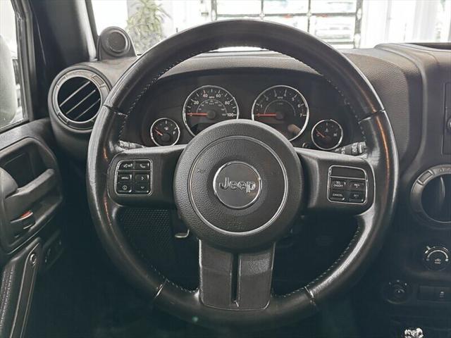 used 2011 Jeep Wrangler Unlimited car, priced at $11,900