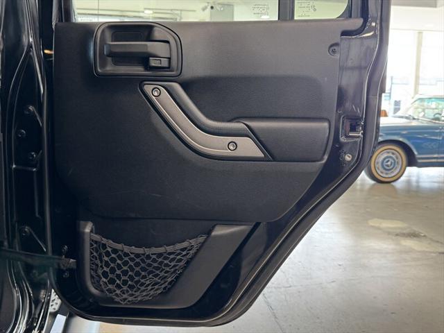 used 2011 Jeep Wrangler Unlimited car, priced at $12,490