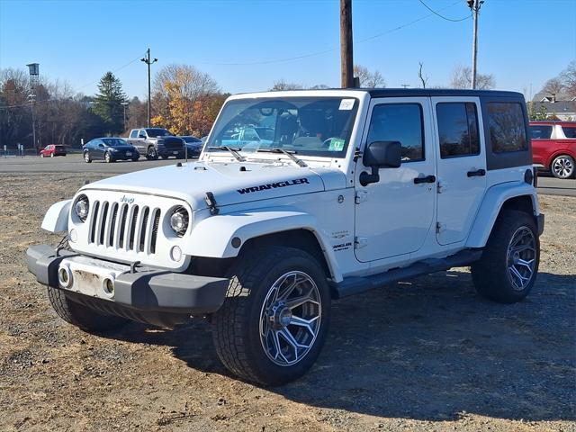 used 2012 Jeep Wrangler Unlimited car, priced at $13,499