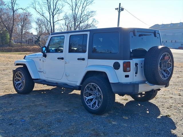 used 2012 Jeep Wrangler Unlimited car, priced at $13,499