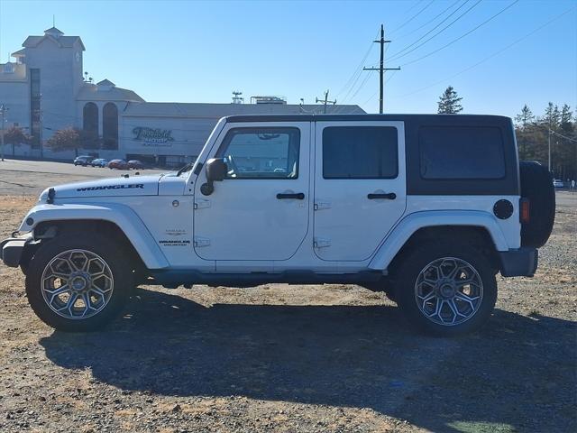 used 2012 Jeep Wrangler Unlimited car, priced at $13,499