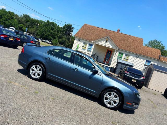 used 2012 Ford Fusion car, priced at $7,995