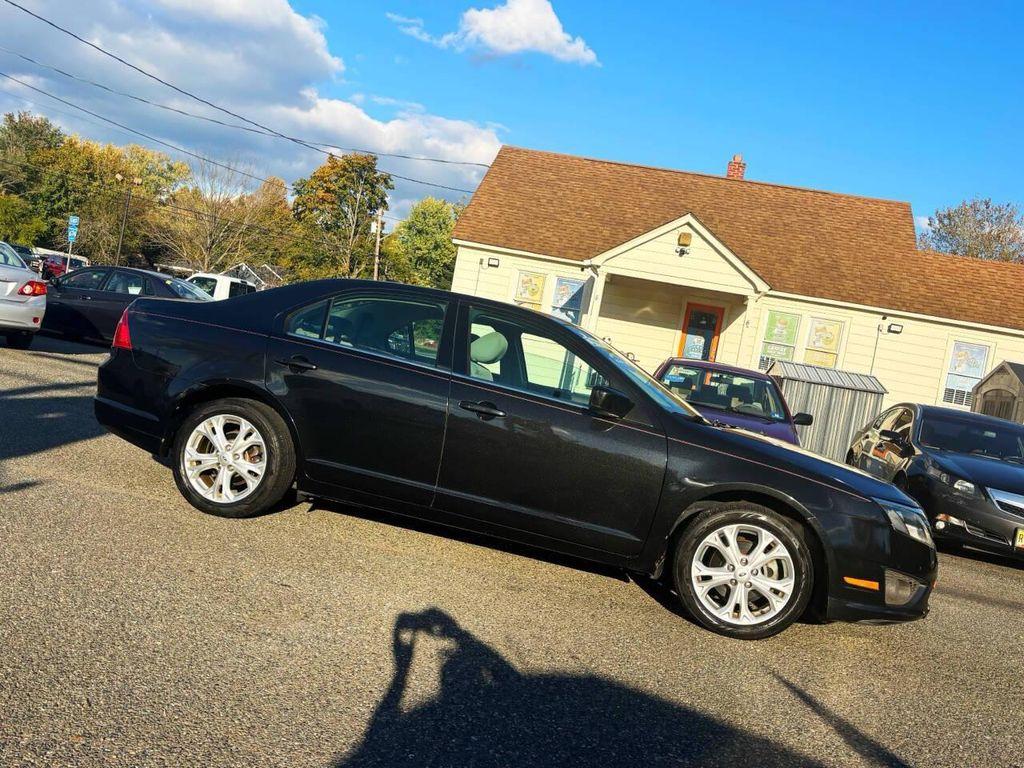 used 2012 Ford Fusion car, priced at $6,995