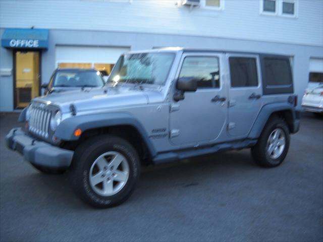 used 2013 Jeep Wrangler Unlimited car, priced at $12,995