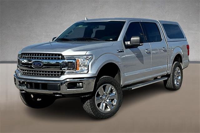 used 2018 Ford F-150 car, priced at $24,511
