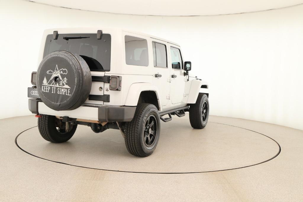 used 2012 Jeep Wrangler Unlimited car, priced at $15,988
