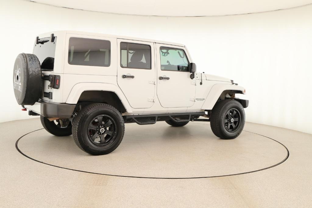 used 2012 Jeep Wrangler Unlimited car, priced at $15,988