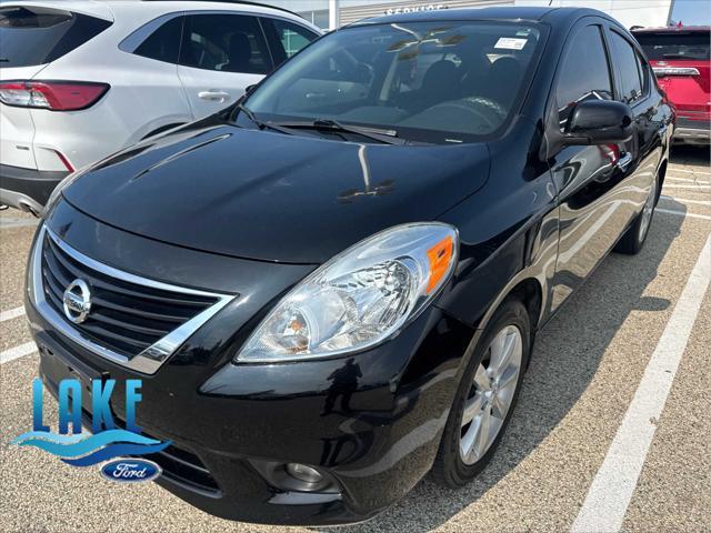 used 2014 Nissan Versa car, priced at $8,999