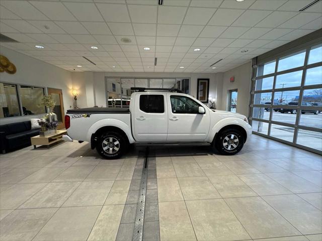 used 2013 Nissan Frontier car, priced at $17,296