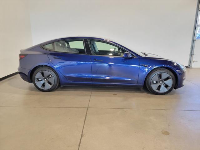 used 2023 Tesla Model 3 car, priced at $28,500