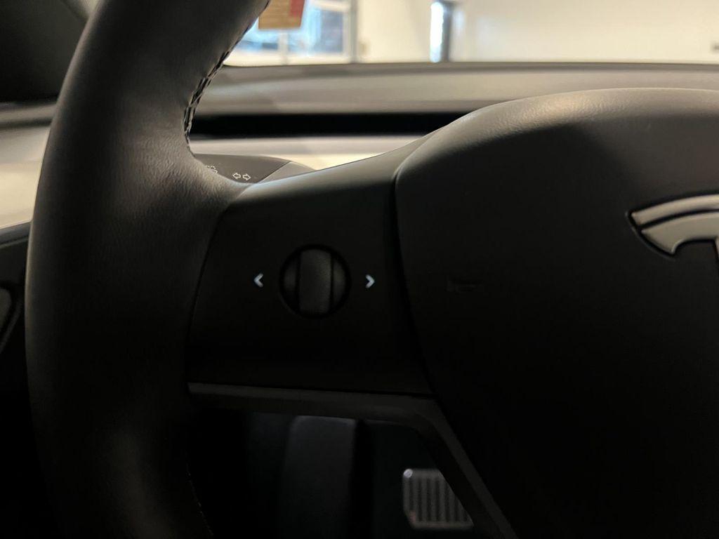 used 2023 Tesla Model Y car, priced at $30,995