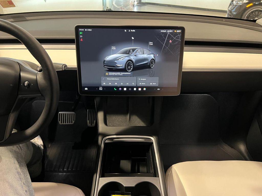 used 2023 Tesla Model Y car, priced at $30,995