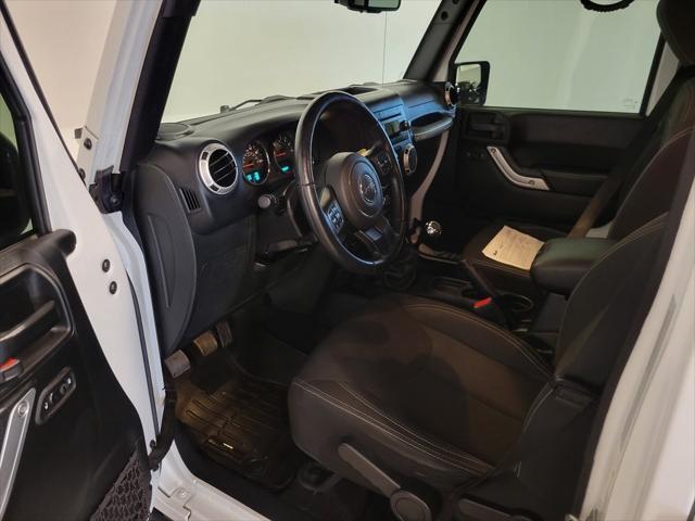 used 2018 Jeep Wrangler JK Unlimited car, priced at $23,599