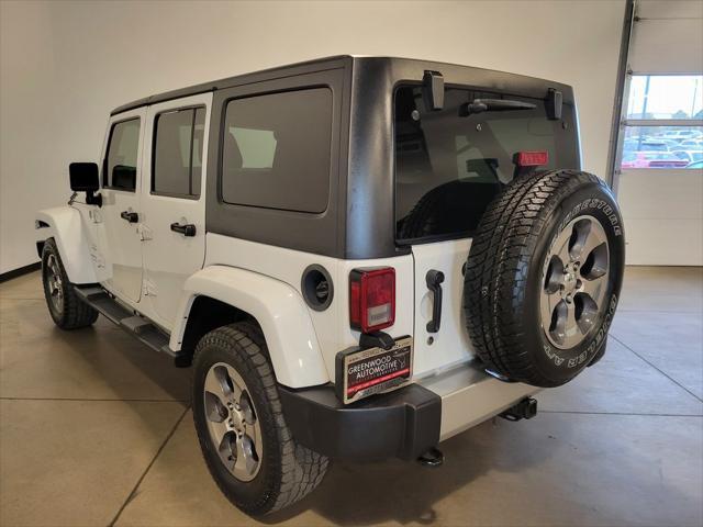 used 2018 Jeep Wrangler JK Unlimited car, priced at $23,599