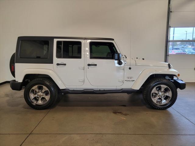 used 2018 Jeep Wrangler JK Unlimited car, priced at $23,599