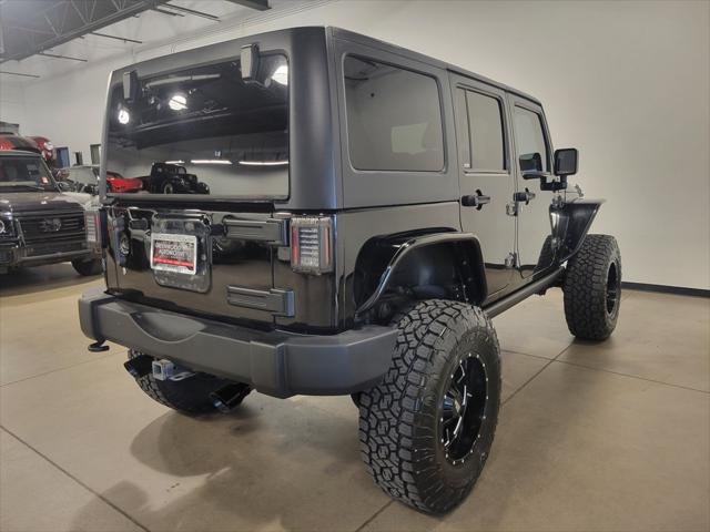 used 2013 Jeep Wrangler Unlimited car, priced at $22,995