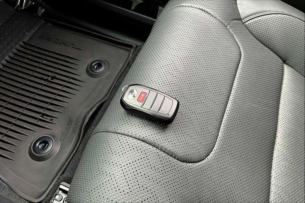 used 2024 Toyota Tundra Hybrid car, priced at $52,000