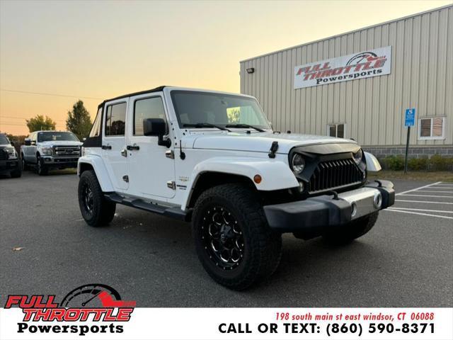 used 2015 Jeep Wrangler Unlimited car, priced at $9,500