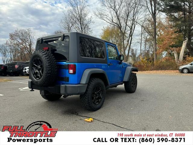 used 2015 Jeep Wrangler car, priced at $13,999