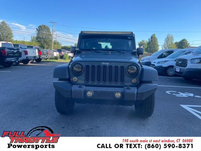 used 2014 Jeep Wrangler car, priced at $13,999