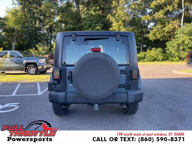 used 2014 Jeep Wrangler car, priced at $13,999