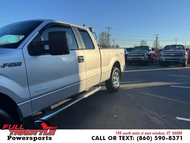 used 2014 Ford F-150 car, priced at $9,999