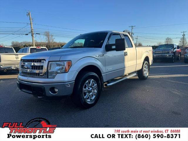 used 2014 Ford F-150 car, priced at $9,999