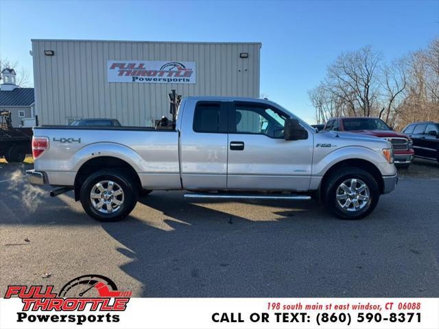 used 2014 Ford F-150 car, priced at $9,999