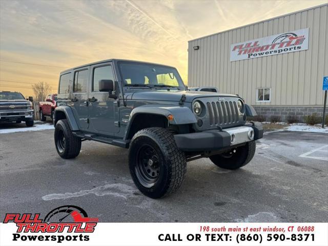 used 2014 Jeep Wrangler Unlimited car, priced at $11,999