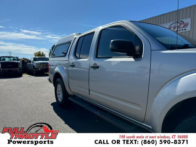 used 2014 Nissan Frontier car, priced at $10,900