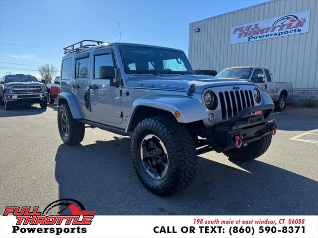 used 2014 Jeep Wrangler Unlimited car, priced at $13,999