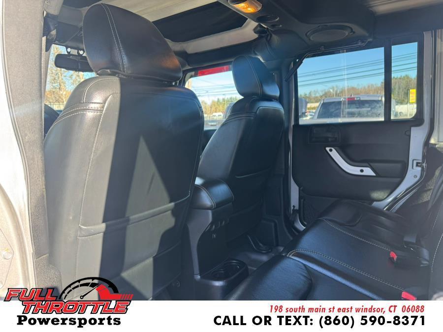 used 2014 Jeep Wrangler Unlimited car, priced at $13,500