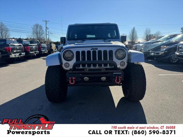 used 2014 Jeep Wrangler Unlimited car, priced at $13,999