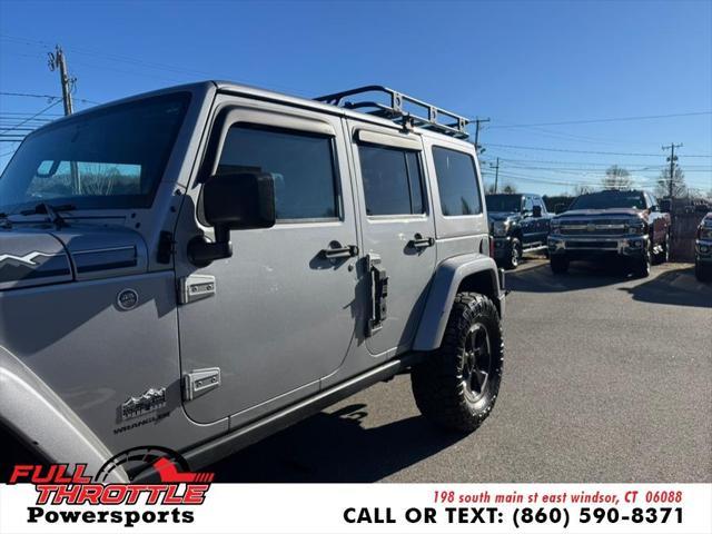 used 2014 Jeep Wrangler Unlimited car, priced at $13,999