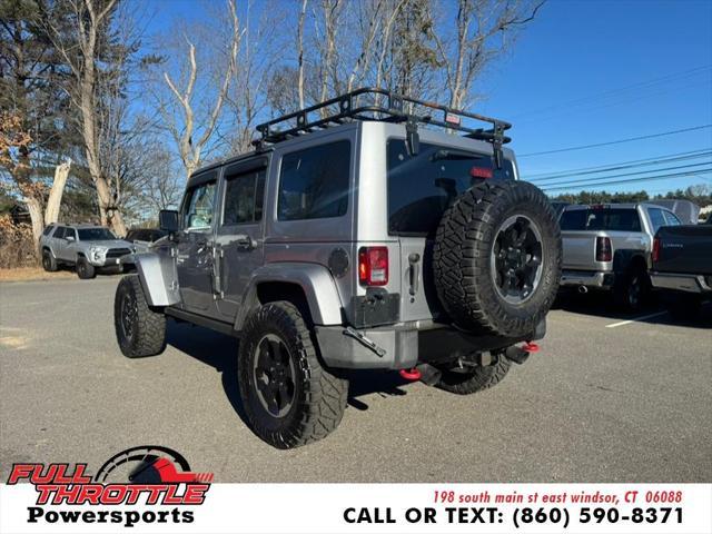 used 2014 Jeep Wrangler Unlimited car, priced at $13,999