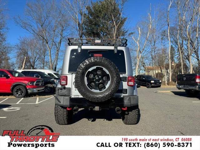 used 2014 Jeep Wrangler Unlimited car, priced at $13,999