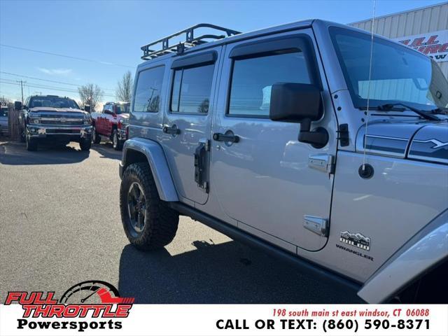 used 2014 Jeep Wrangler Unlimited car, priced at $13,999